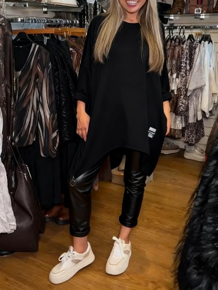 🔥Oferta ograniczona czasowo – dwuczęściowy zestaw składający się z luźnej bluzki o nieregularnym kroju i jednolitych spodni