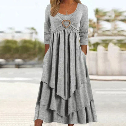 ✨👗 Vestido midi em camadas com detalhe em forma de coração – Corte em A que realça a silhueta e tecido leve, ideal para viagens ou encontros