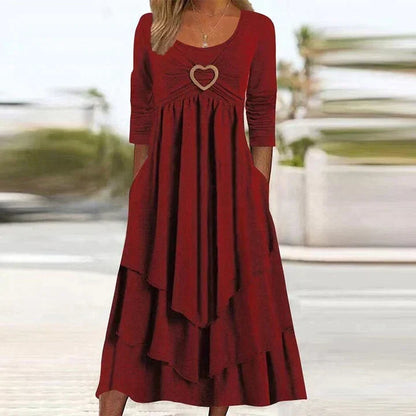✨👗 Vestido midi em camadas com detalhe em forma de coração – Corte em A que realça a silhueta e tecido leve, ideal para viagens ou encontros