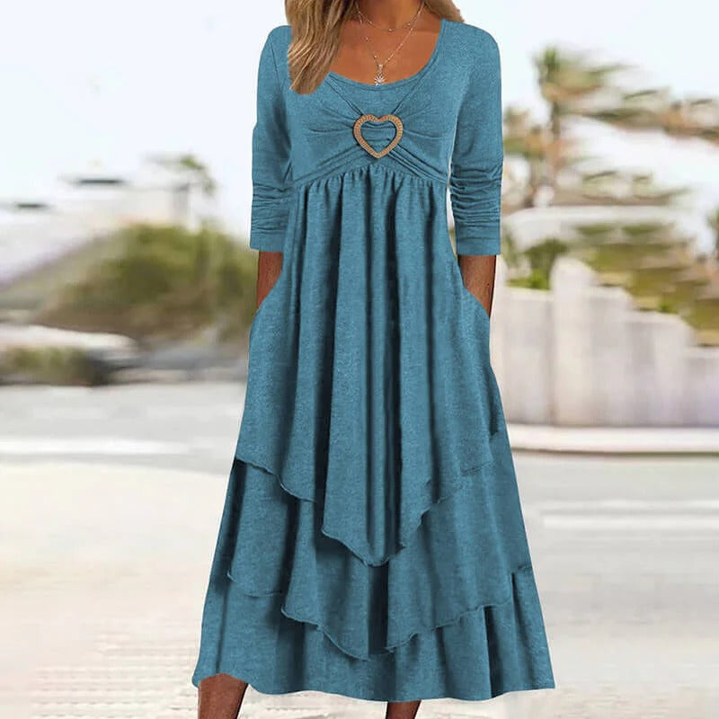 ✨👗 Vestido midi em camadas com detalhe em forma de coração – Corte em A que realça a silhueta e tecido leve, ideal para viagens ou encontros