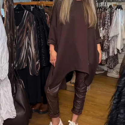 🔥Oferta ograniczona czasowo – dwuczęściowy zestaw składający się z luźnej bluzki o nieregularnym kroju i jednolitych spodni
