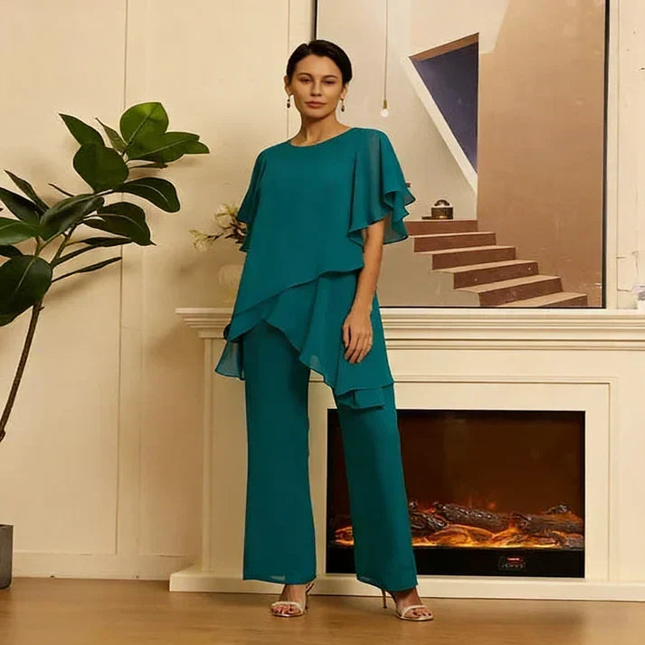 💞Conjunto encantador composto por um top assimétrico e calças de perna larga✨