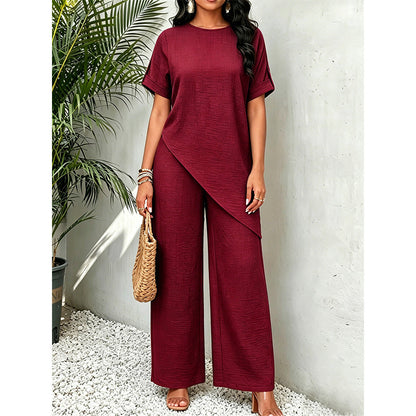 Conjunto de blusa com bainha assimétrica e calça de perna larga