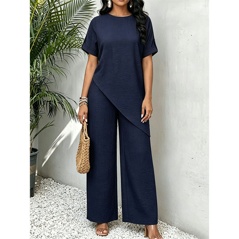 Conjunto de blusa com bainha assimétrica e calça de perna larga